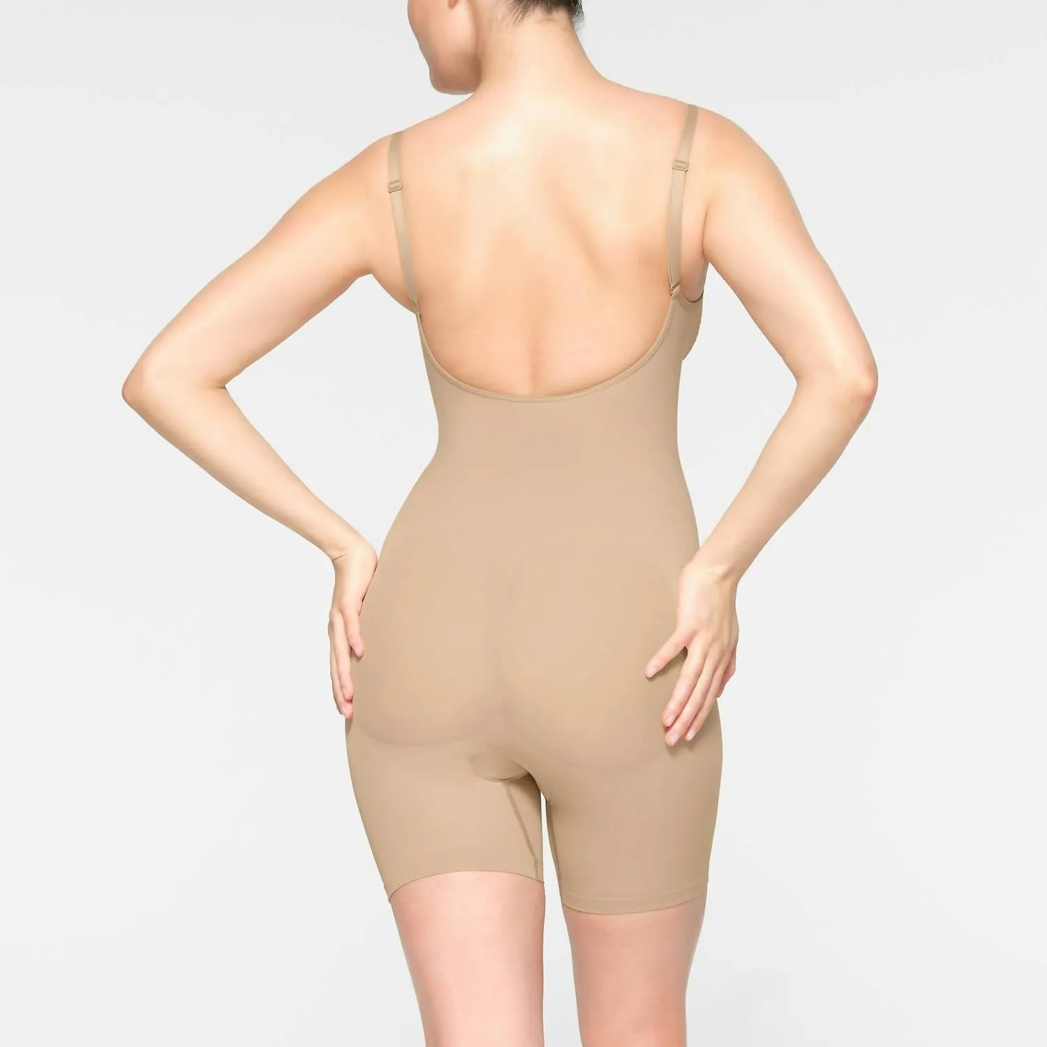 Seamless Sculpt Low Back Mid Thigh Bodysuit In Clay